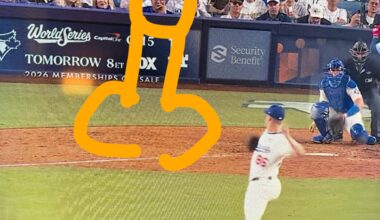 Dean Spanos behind the plate