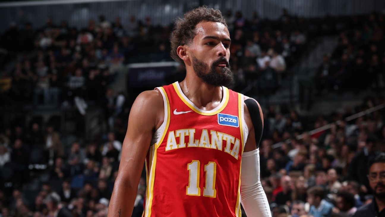 Hawks' Trae Young exits game at Nets with right knee sprain