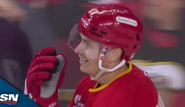 Flames' Yegor Sharangovich Squeaks One Through Igor Shesterkin