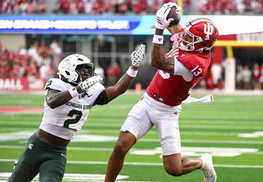Indiana wide receiver Elijah Sarratt catches a touchdown pass against Michigan State on Saturday. Sarratt was one of the former James Madison players who transferred to play for Cignetti.