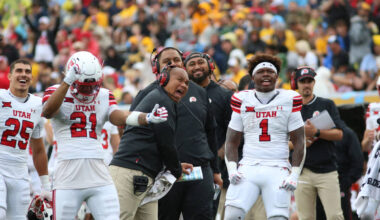 Utah players react during the second half of an NCAA college football game against West Virgini ...