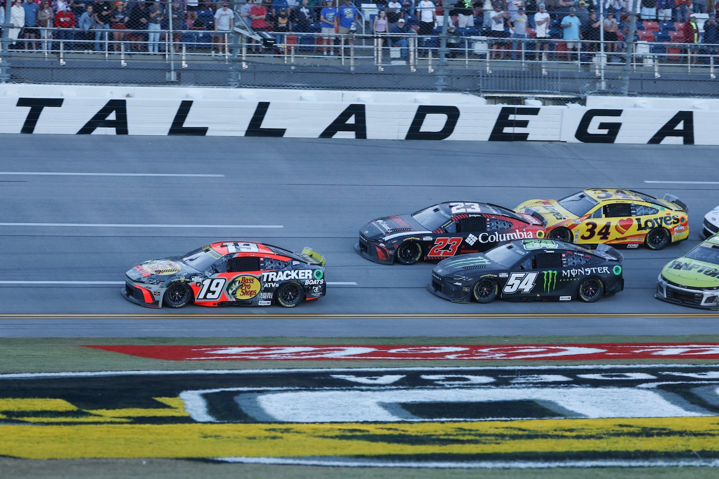 Chase Briscoe (19) leads the pack to the finish line for the win during a NASCAR Cup Series playoff race at Talladega (Ala.) Superspeedway.