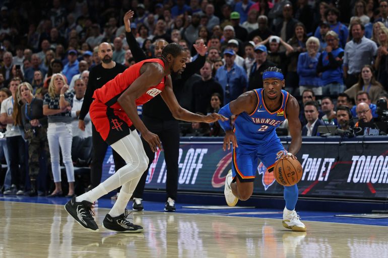 Kevin Durant and Shai Gilgeous-Alexander in action.