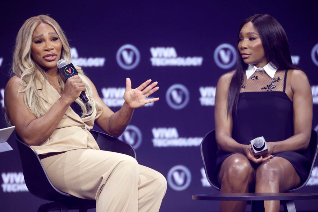 Serena Williams and Venus Williams speaking at a technology conference in 2024