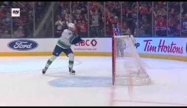 Quinn Hughes takes out his frustration