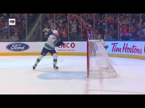 Quinn Hughes takes out his frustration