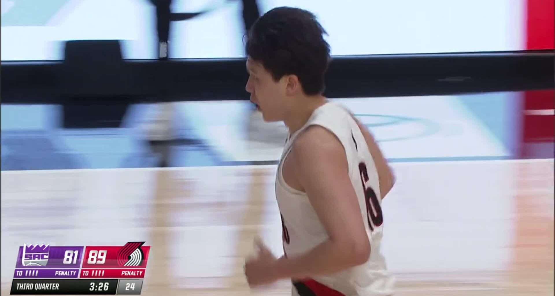 Yang Hansen hits Eubanks with the behind-the-back dribble and spin for the bucket