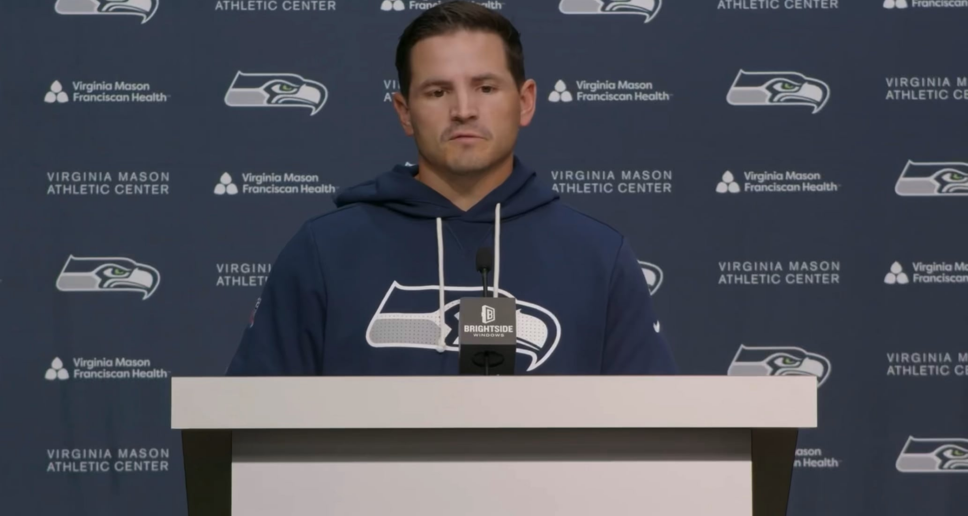 Mike smiles as he gives practice participation status on Witherspoon, Love, and Riq Woolen