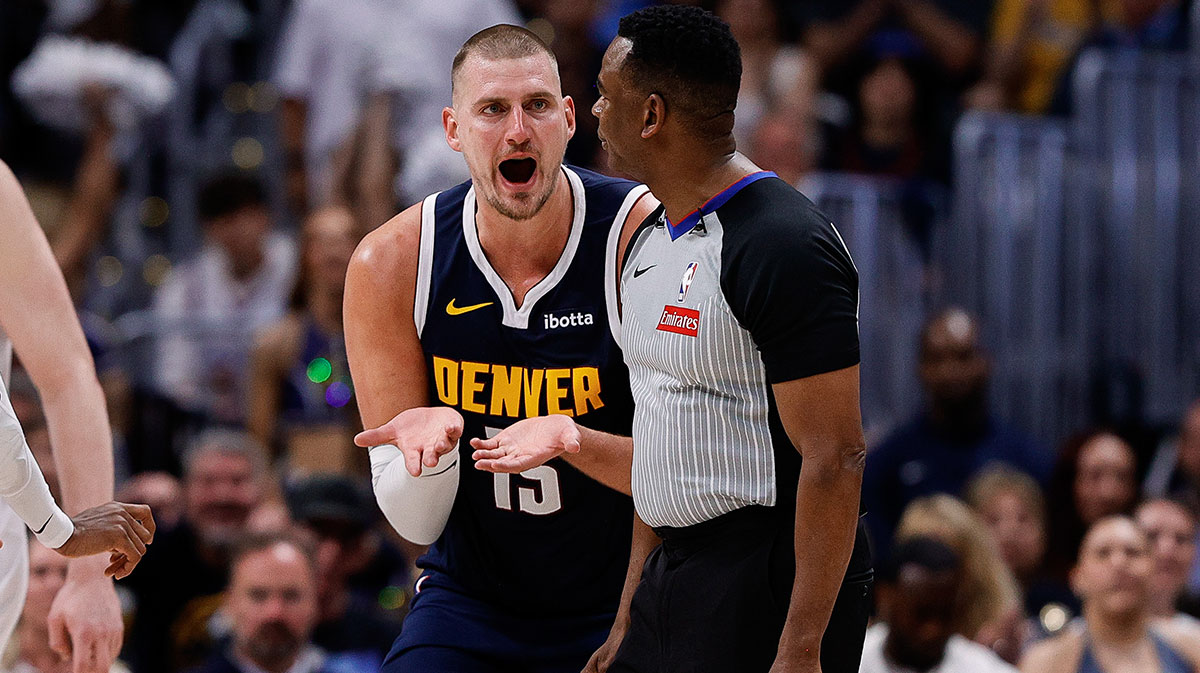 Denver Nuggets center Nikola Jokic (15) reacts towards referee Sean Wright (4) after a play in the second quarter against the Oklahoma City Thunder during game four of the second round of the 2025 NBA Playoffs at Ball Arena. Nikola Jokic reacts to "Chinese Jokic" Yang Hansen's request for photo and signature.