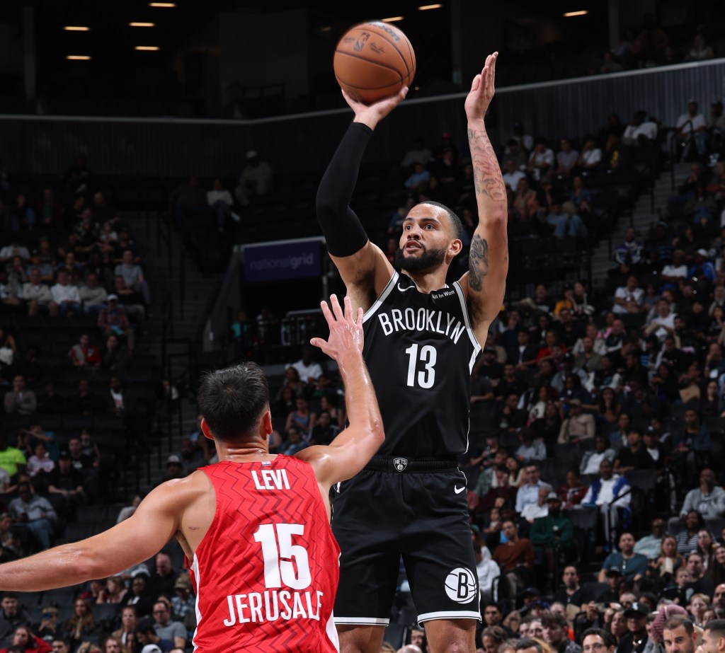 Tyrese Martin shoots a jumper during the Nets' blowout win over Hapoel Jerusalem.