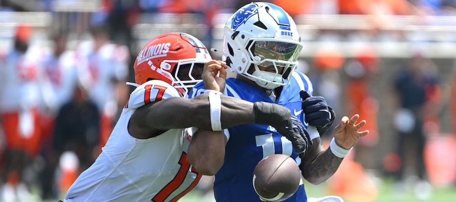 Gabe Jacas stripping the ball from Duke QB Darian Mensah
