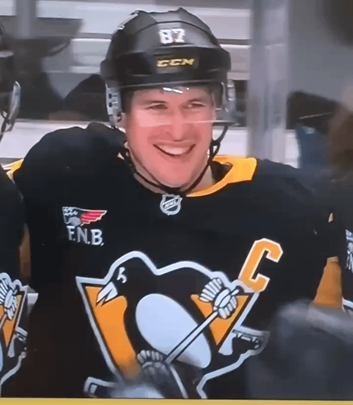 EK65 wiping Crosbys nose to celebrate his 1,700 NHL points