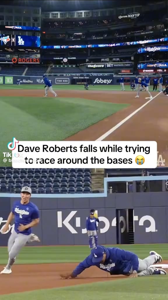 Dave Roberts face planted trying to race Dodgers rookie Hyeseong Kim during the Dodgers workout in Toronto.