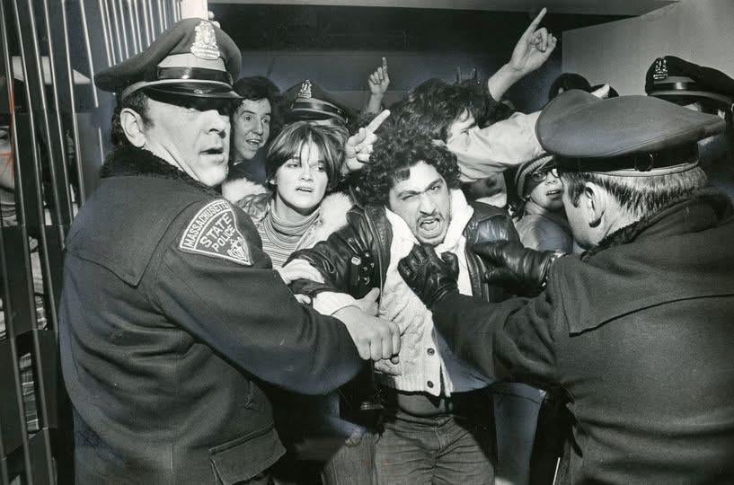 New England Patriots fans rioting after their 24-21 loss to the Oakland Raiders in the 1976 AFC Divisional Playoffs. The Raiders scored the winning TD after a controversial roughing the passer call against New England defensive lineman Ray “Sugar Bear” Hamilton.