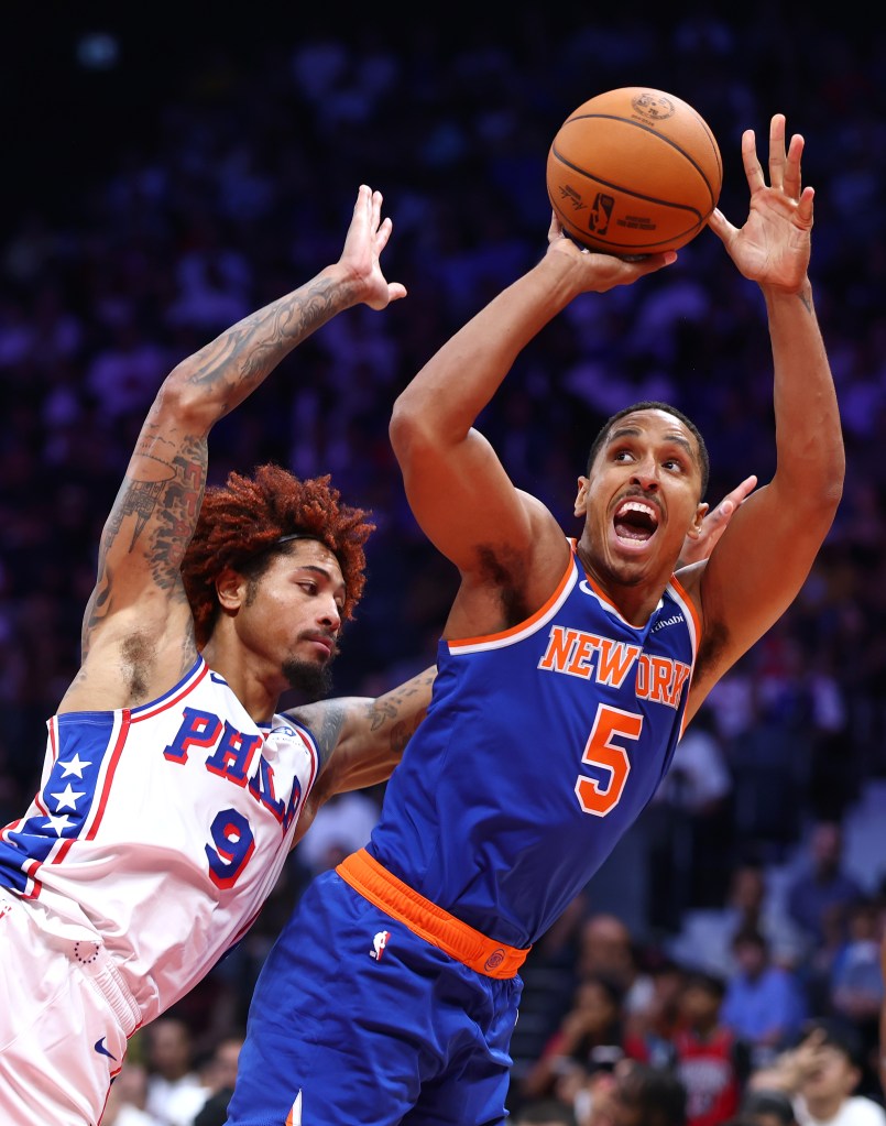 Malcolm Brogdon (5) shoots during the Knicks' game against the 76ers in Abu Dhabi on Oct. 4, 2025.