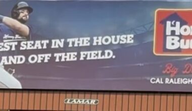 An actual billboard outside of T mobile Park for a portapotty company and one of the best ive ever seen