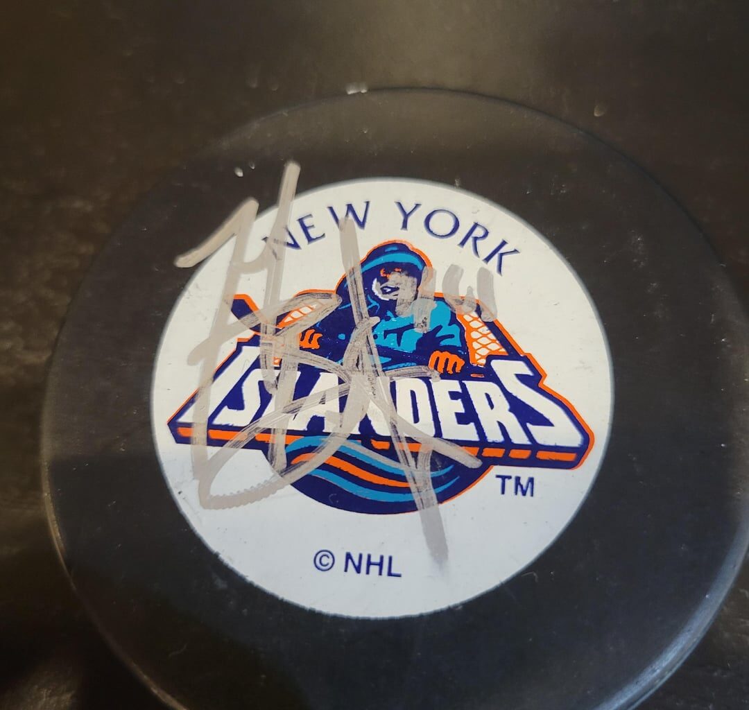 Assistance with signed pucks.