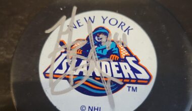 Assistance with signed pucks.