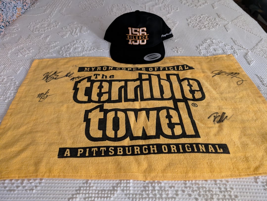 Went to a concert last night and got my Terrible Towel signed by Pittsburgh natives 156/Silence