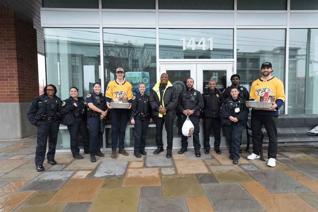 Hague, Skjei, and Blankenburg delivered Thanksgiving meals with the MNPD