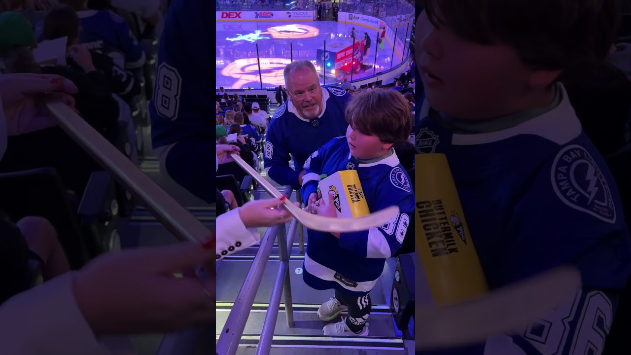 Speechless! One lucky fan received a replica gold stick for Kuch's 1K ceremony!  #nhl #gobolts