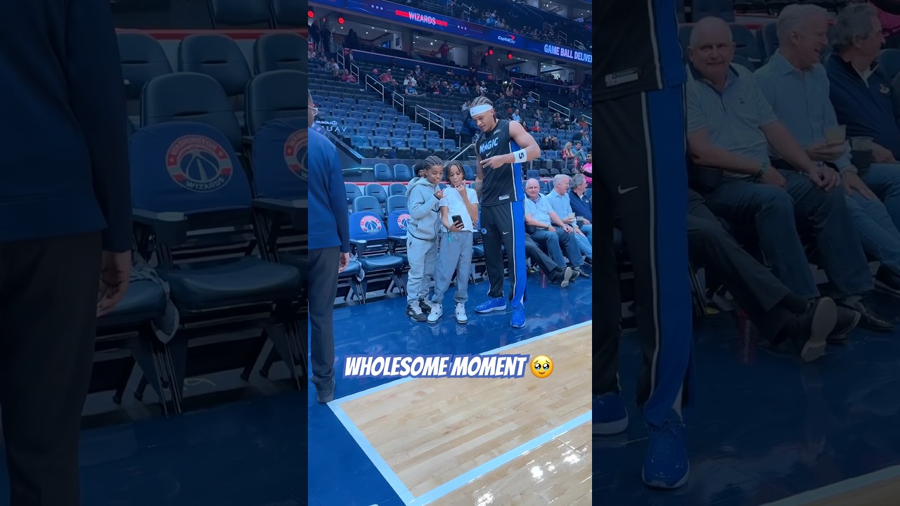 Paolo taking a photo with some young fans!