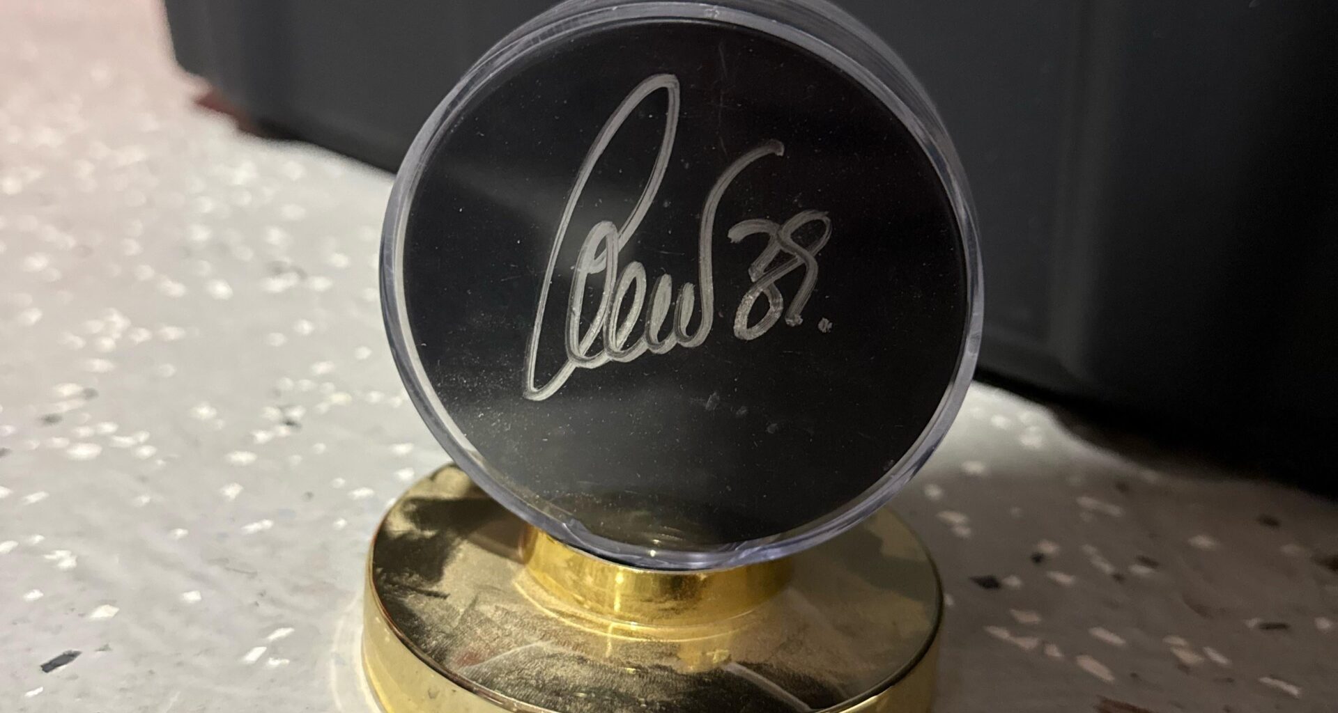 Who signed this puck??