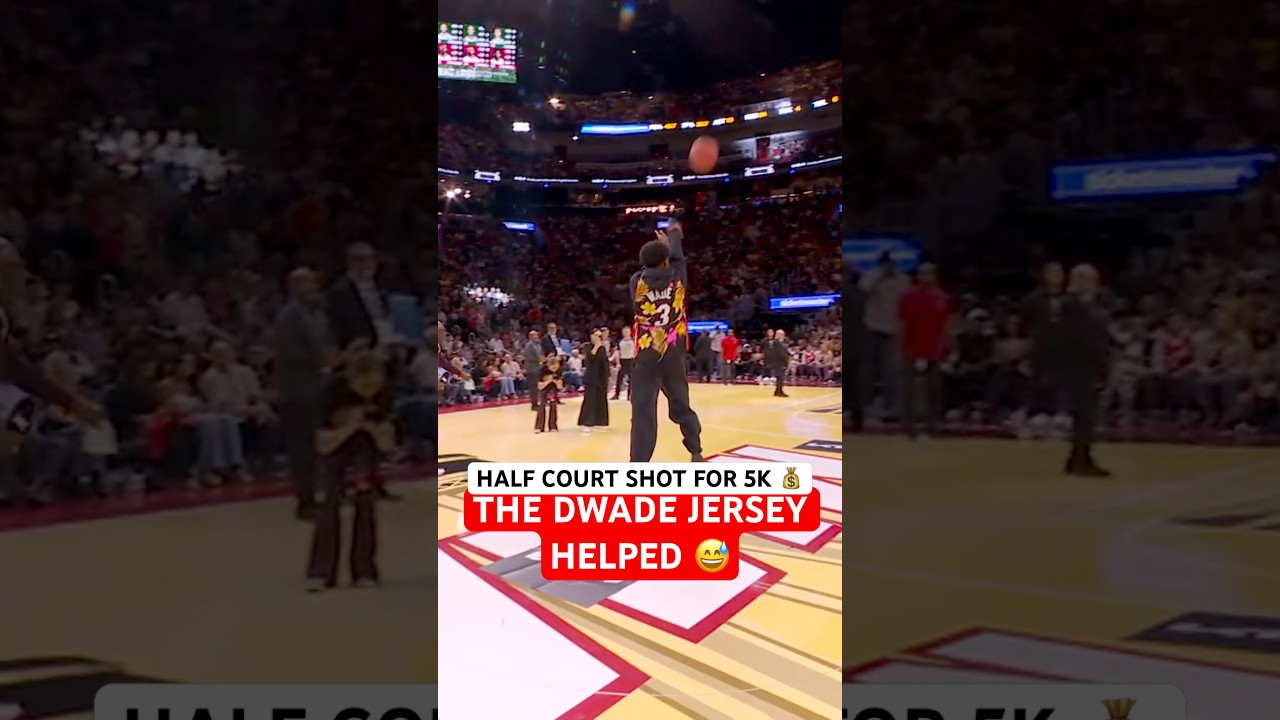 Fan hits a half court shot for 5K!
