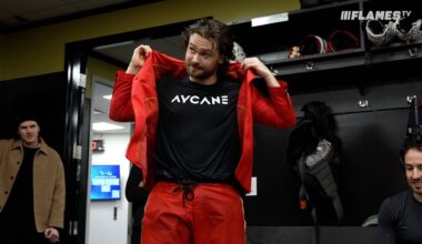 Give the puck (and blazer) to 4! Andersson leads the Flames over the Canucks