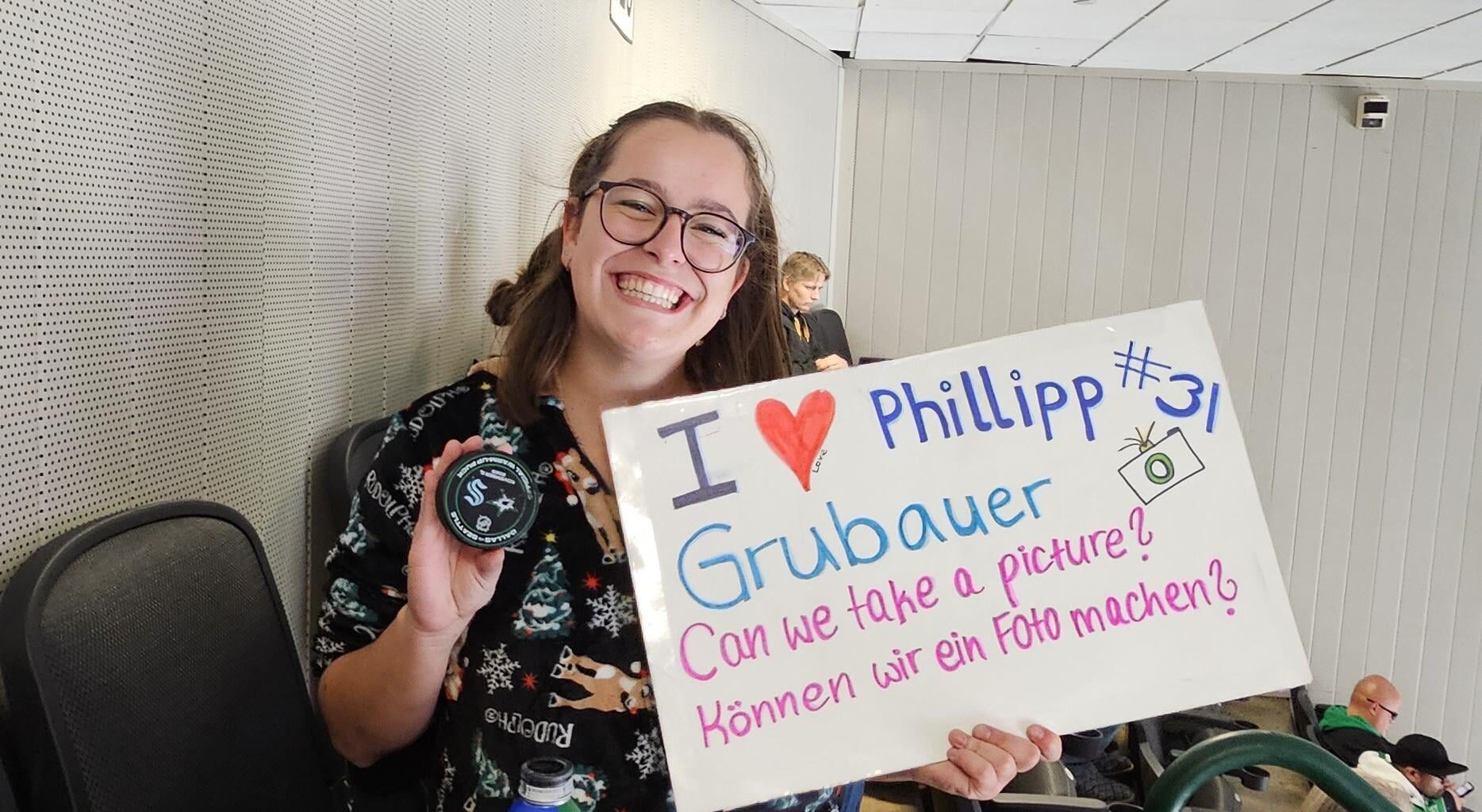 My German daughter was given a warmup puck by Grubauer because he saw her sign!