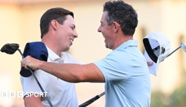 Matt Fitzpatrick and Rory McIlroy embrace after the Englishman defeated the Northern Irishman in a play-off to win the DP World Tour Championship.