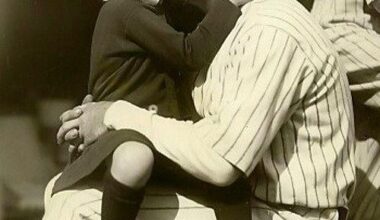 Babe Ruth gets a good luck kiss from his daughter before Game 3 of the 1927 World Series. Ruth hit a three run homer in the game as the Yankees won 8-1.