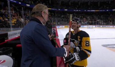Sidney and Peter Forsberg exchanging sticks after today's game in Stockholm.