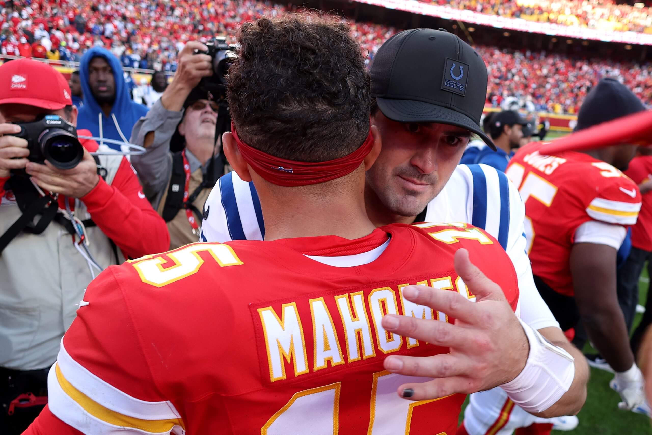 Patrick Mahomes and Daniel Jones embrace after the Chiefs beat the Colts in overtime.