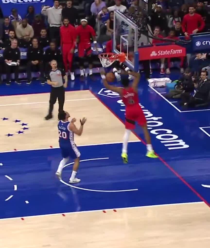 Scottie Barnes sends a kiss to Jared McCain before dunking