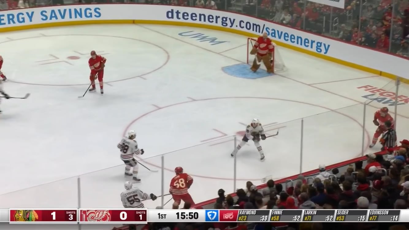 Larkin gets a piece of it to tie the game after Ed makes a great feed to Raymond