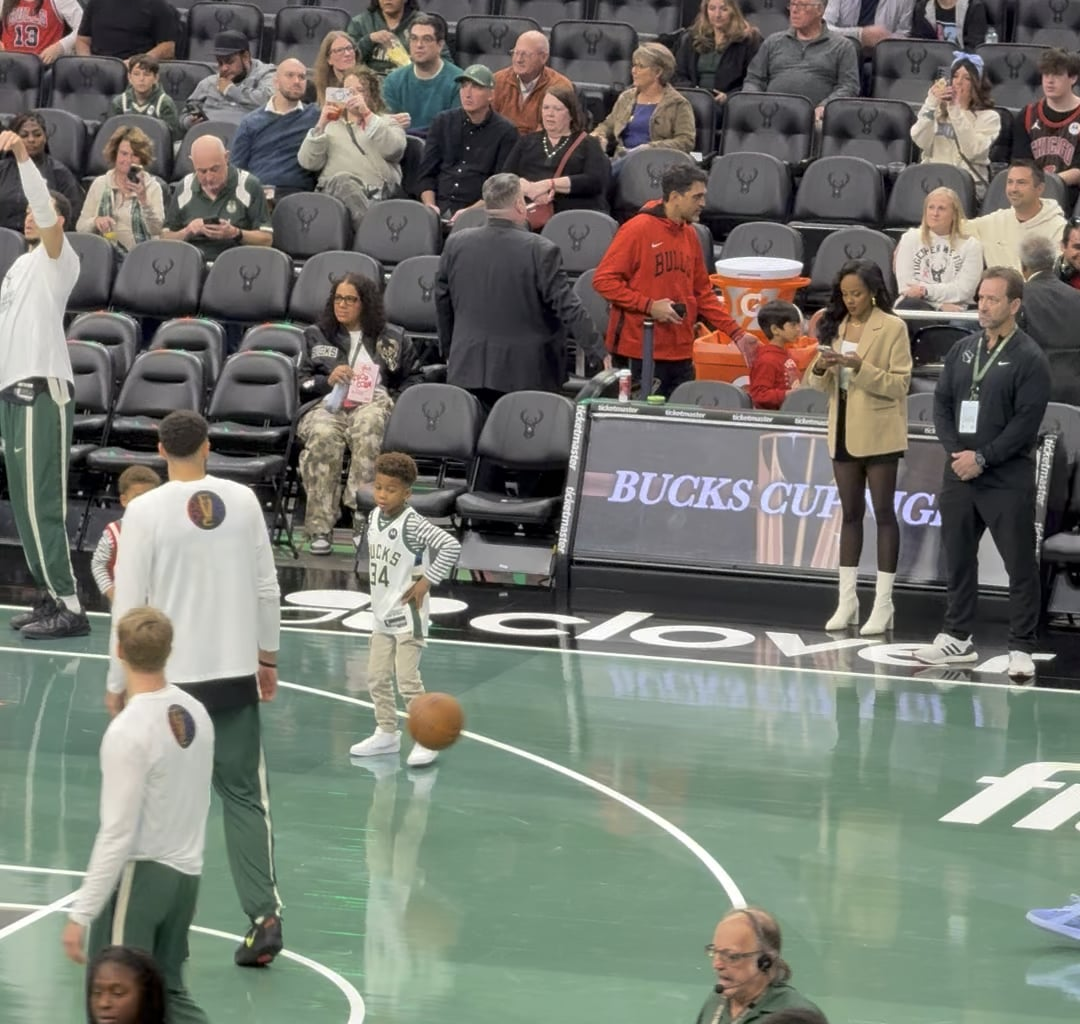 Giannis warming up with his kids!