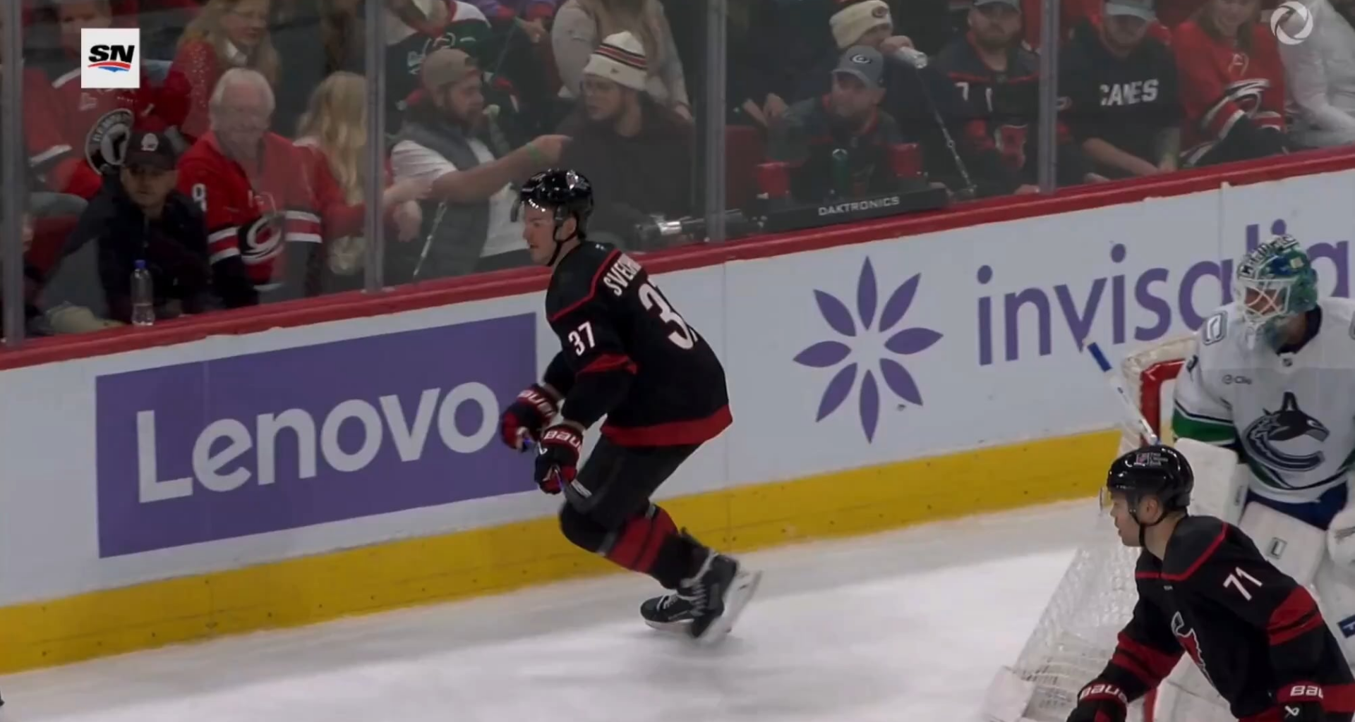 Andrei Svechnikov throws an elbow into the head of Filip Hronek. Hronek did not return to the game.