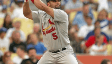 “Albert Pujols stretches out into his familiar batting stance—legs wide apart, bat quivering high above his shoulder, head up in an oddly proud way, like he’s a soldier sitting on a horse, like he’s posing for posterity.” — Joe Posnanski, 2009, describing Pujols’ stance at the height of his peak.