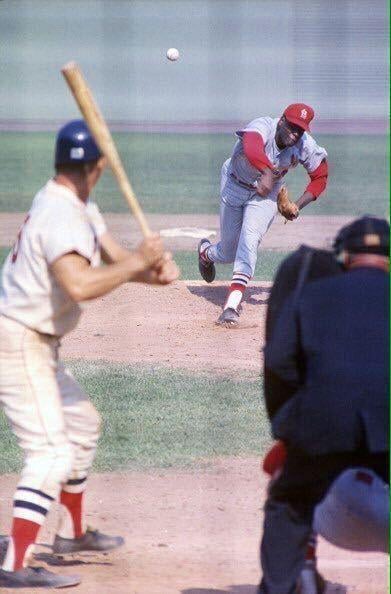 Bob Gibson delivers a pitch in the 1967 World Series. He was named World Series MVP. Gibson pitched three complete-game victories (Games 1, 4, and 7) in the series, tying Christy Mathewson's 1905 World Series record.