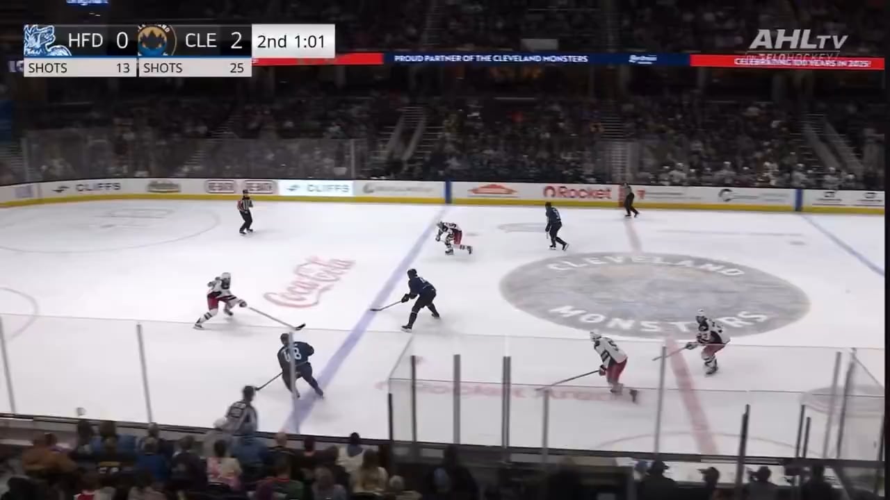 Spencer Martin gets bowled over and a scrum ensues. Connor Mackey gets a fighting major. The Wolf Pack go on to win the game.