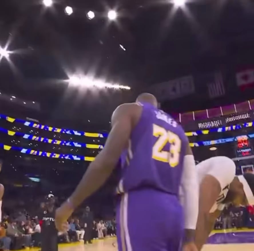 LeBron messing with AD during tip off