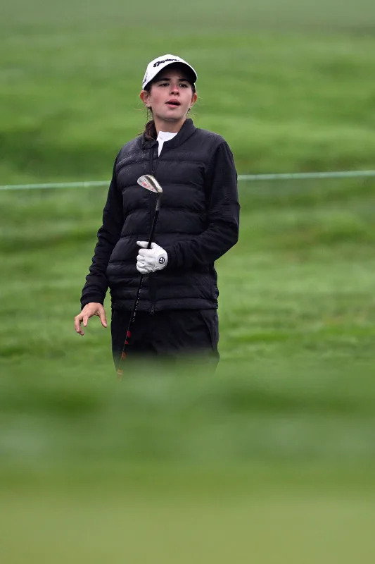 LA JOLLA, CALIFORNIA - FEBRUARY 12: Kai Trump watches her shot on the ninth hole prior to The Genesis Invitational 2025 at Torrey Pines Golf Course on February 12, 2025 in La Jolla, California. (Photo by Orlando Ramirez/Getty Images)Orlando Ramirez&sol;Getty Images
