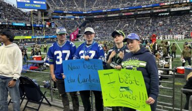 John Schneider signed my cancer sign at Cardinals game