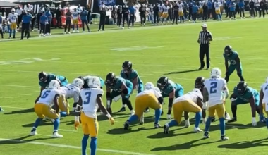 Tuten drives two defenders into the endzone.