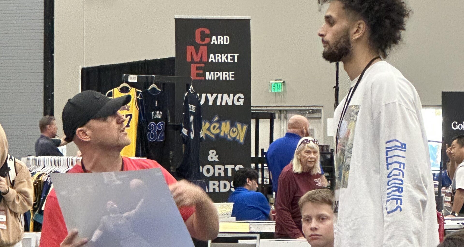 Dereck Lively shopping for trading cards at the Dallas Card Show