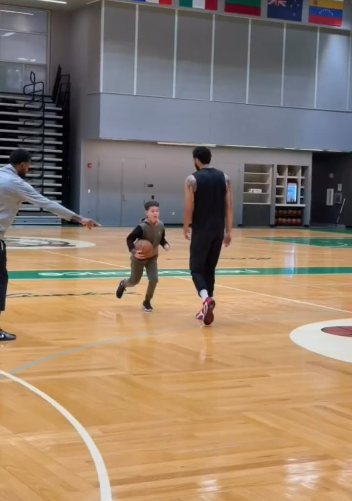 Deuce helping JT with his workout