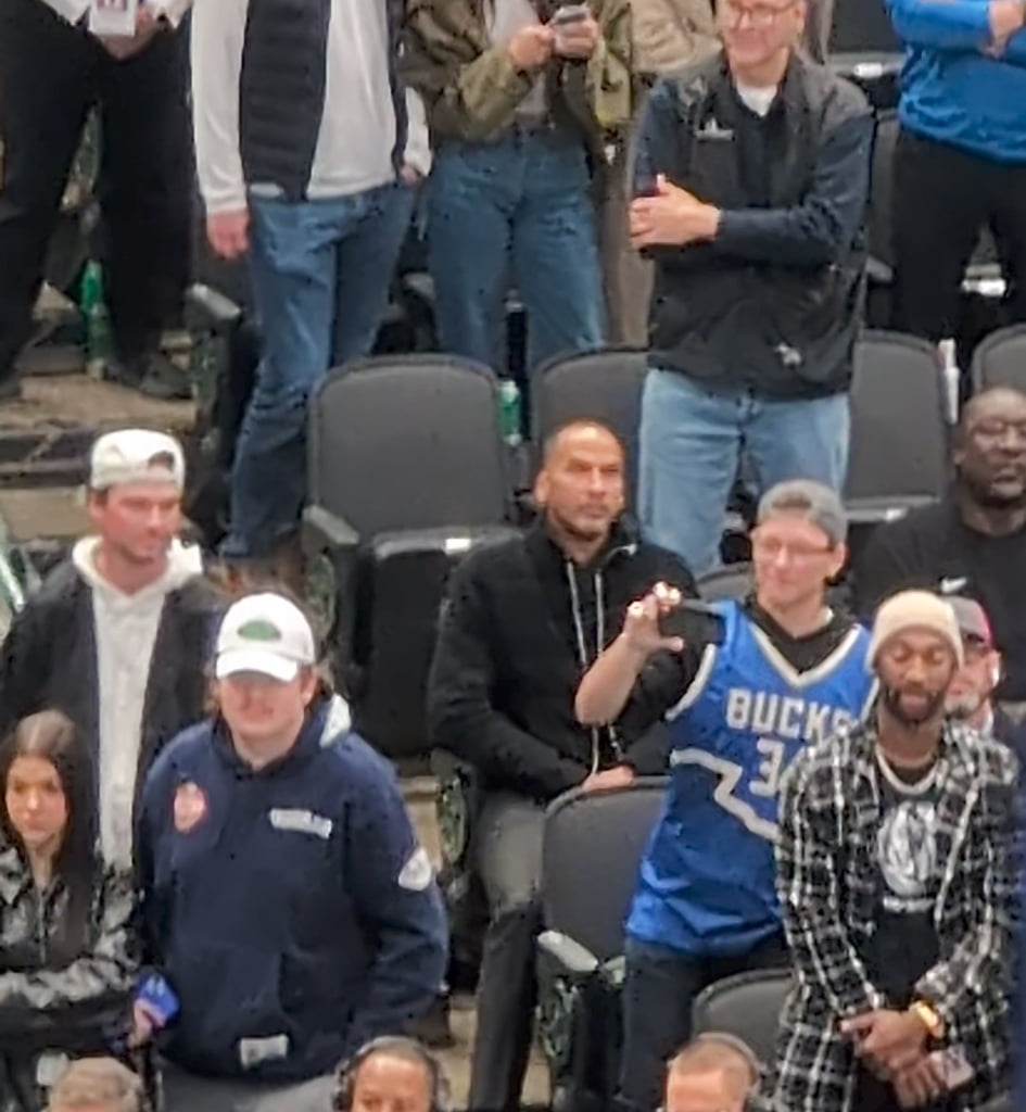 Nico straight faced as the fans chant to fire him