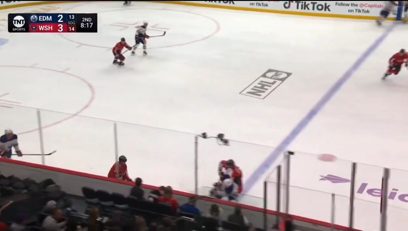 Evan Bouchard attempts to stop Ryan Leonard