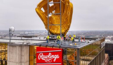 Rawlings adds giant gold glove to roof of St. Louis headquarters